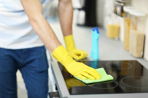 Deep cleaning team working in a Fawkner kitchen