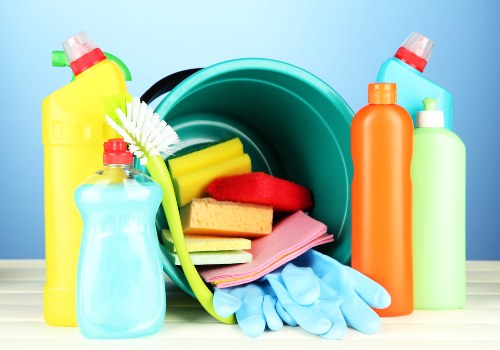 Cleaner scrubbing a kitchen countertop during deep cleaning